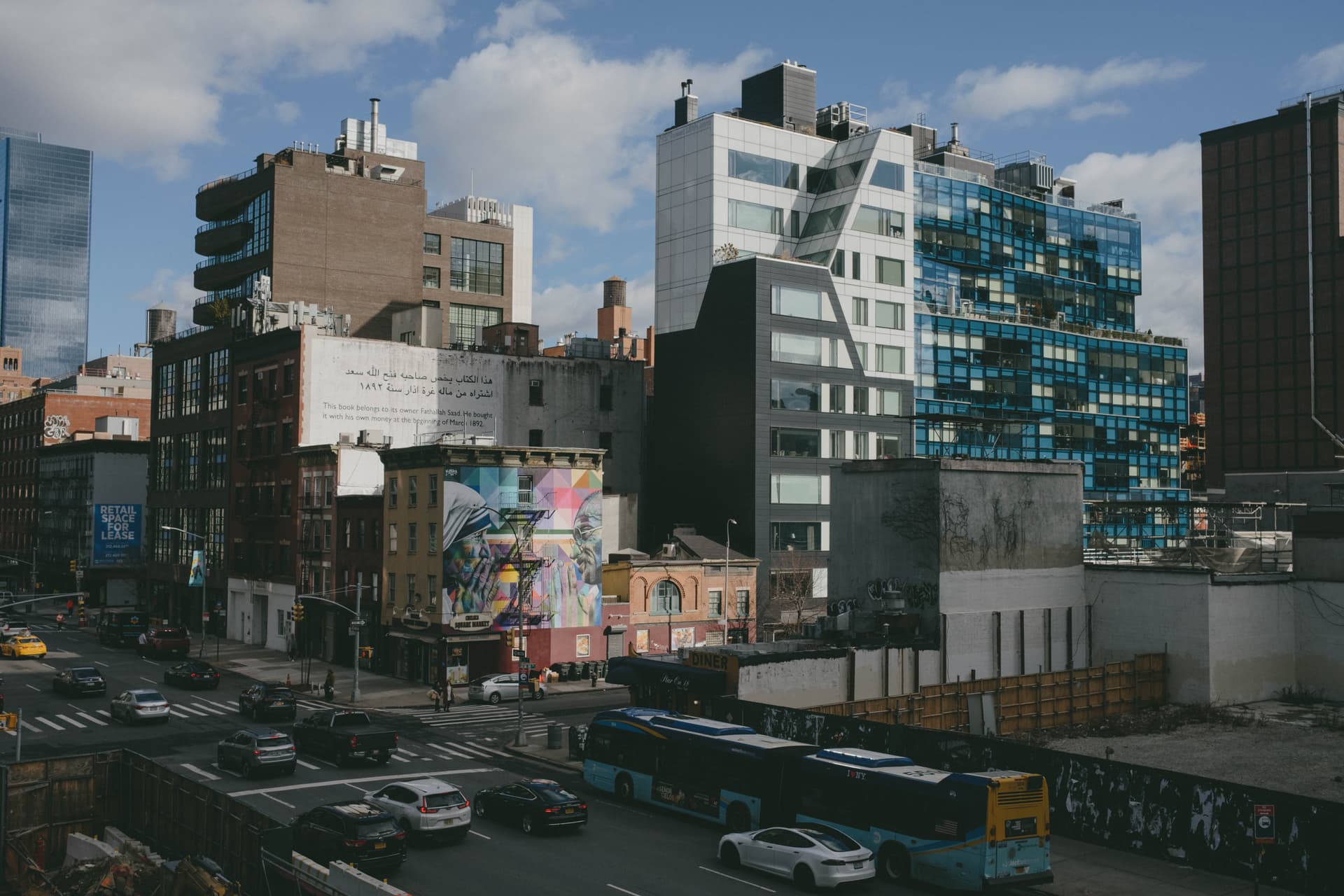 Multiple buildings of Midtown Manhattan, taken from a vantage point along the High Line.