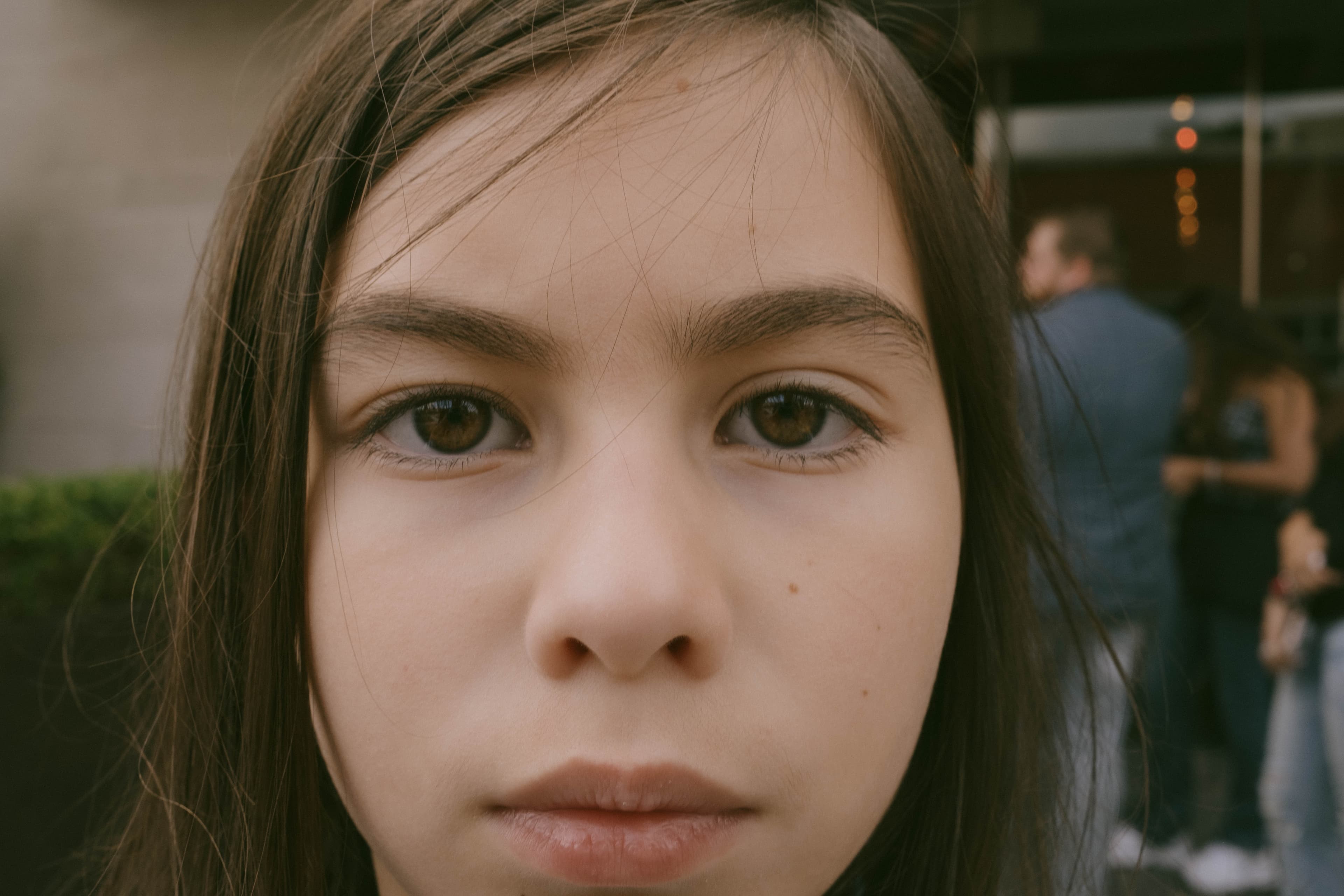 Portrait of young girl, serious expression