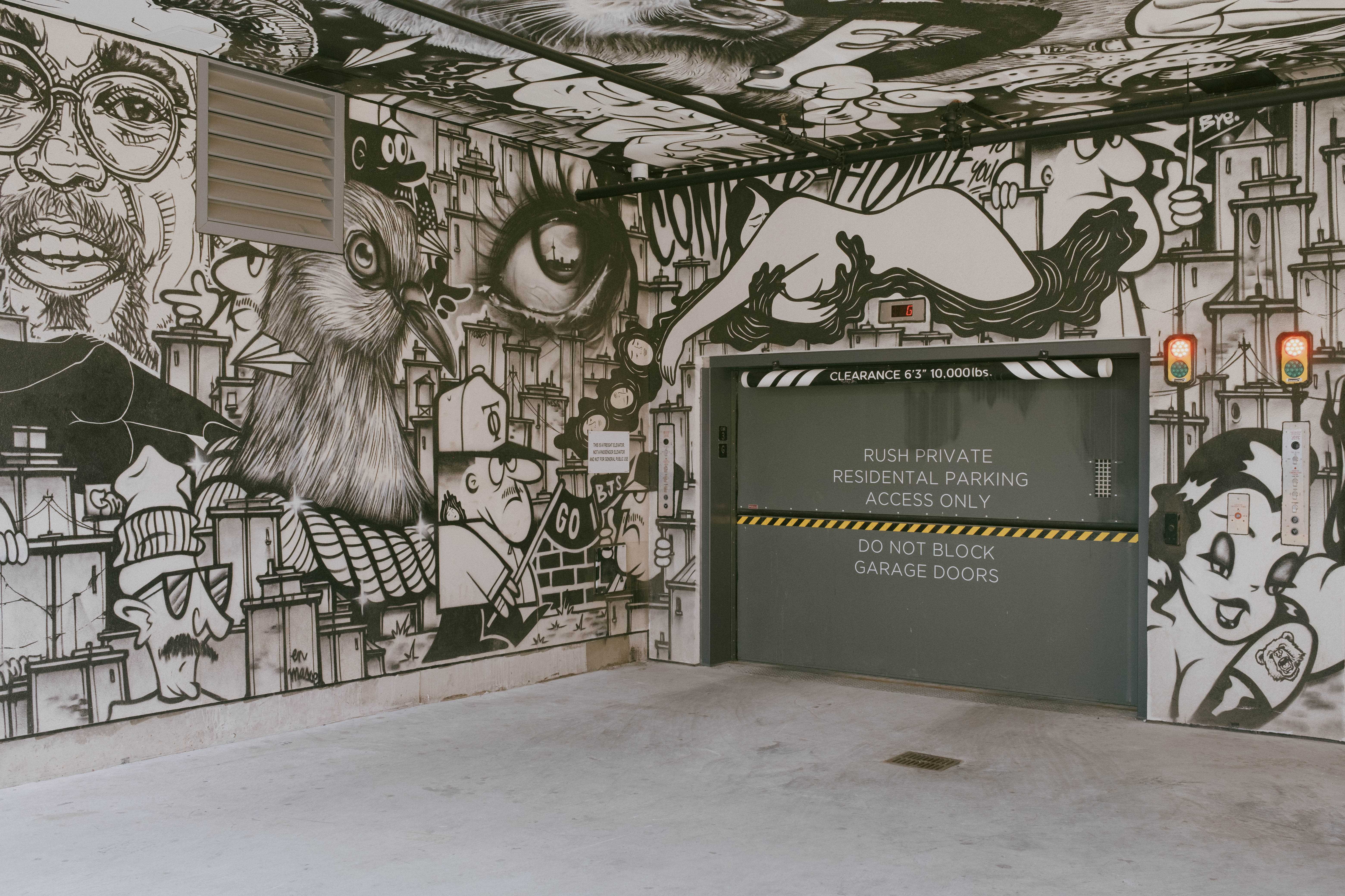 Garage entry with an elaborate black and white mural