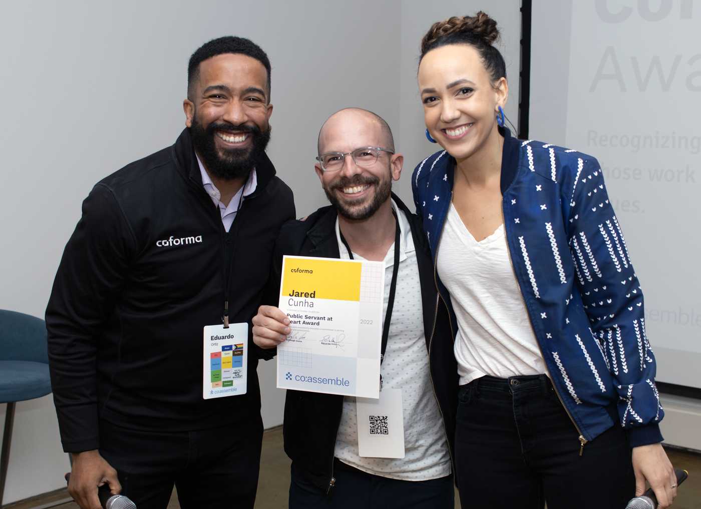 Me, holding an award and standing between Eduardo Ortiz and Ashleigh Axios.