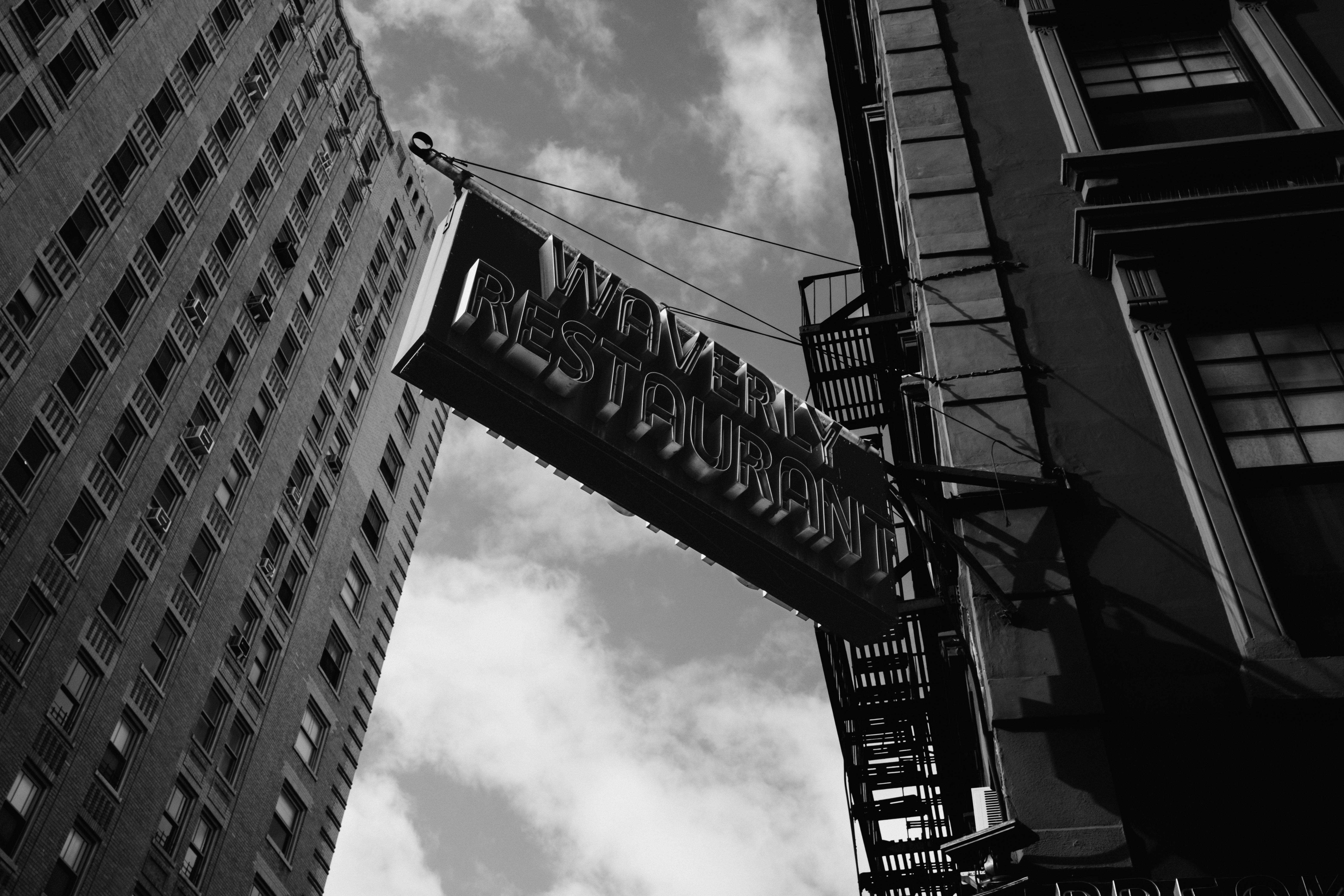 Leading lines of the High Line path with a woman standing eerily at the end