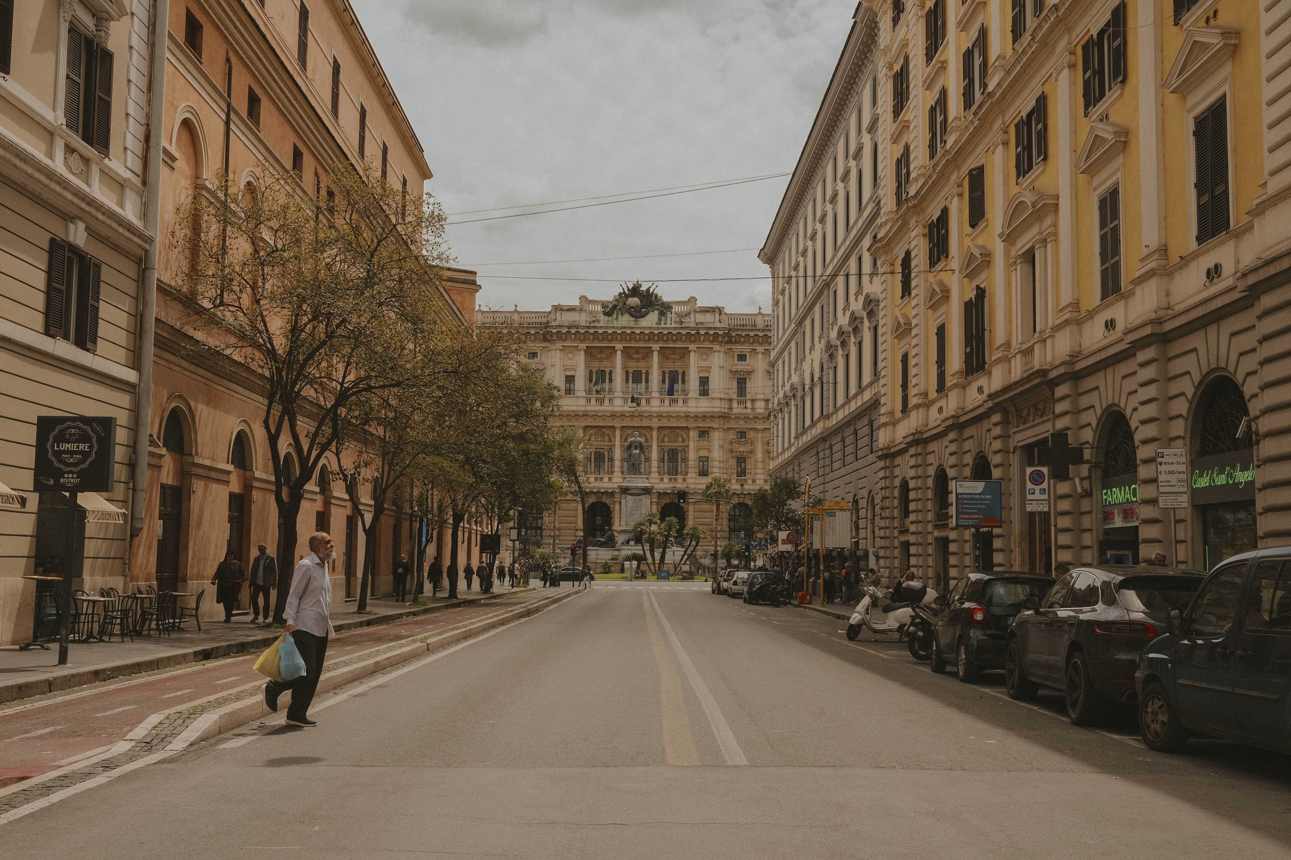 Man about to cross an empty street