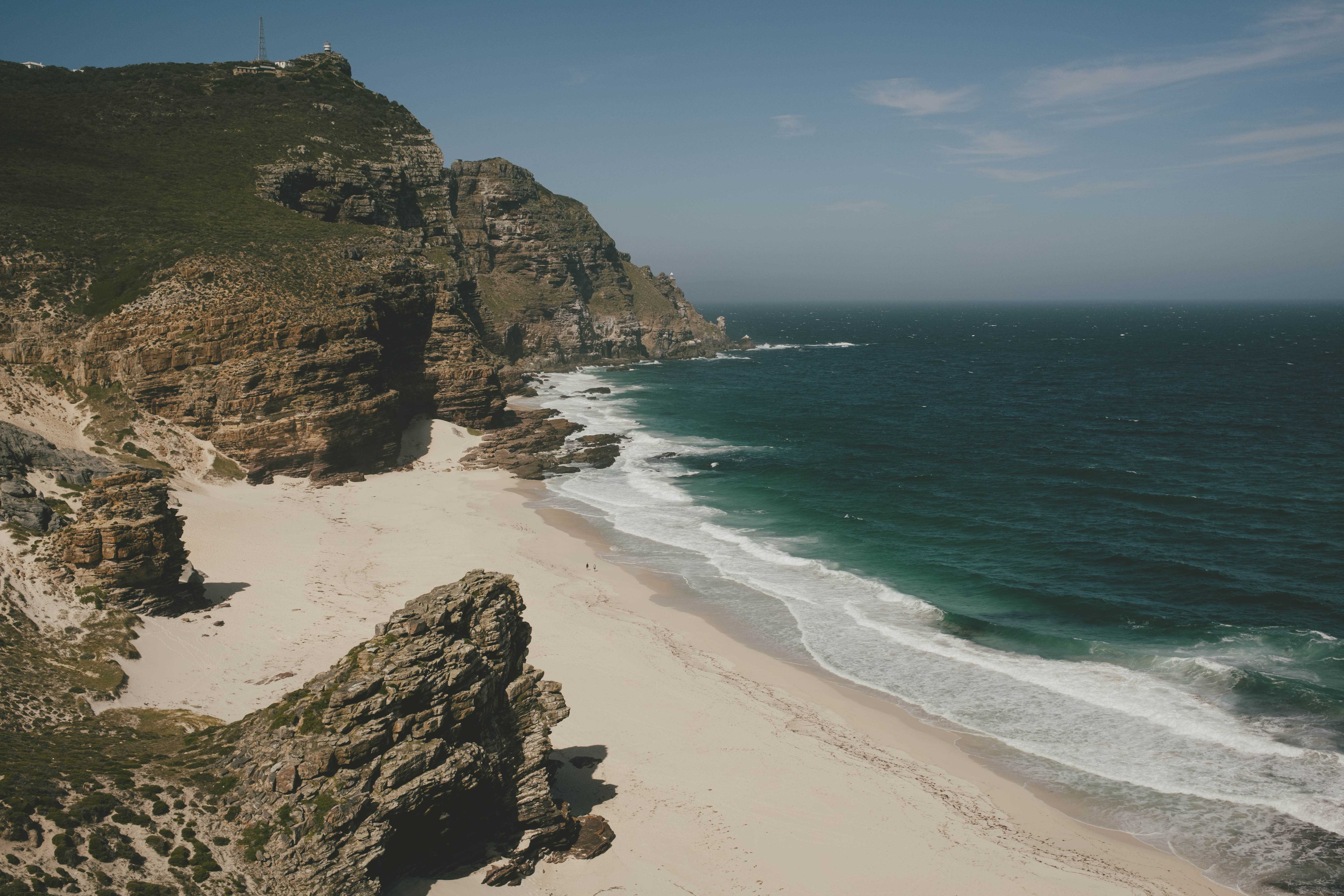 A secluded beach far below the hiking trail