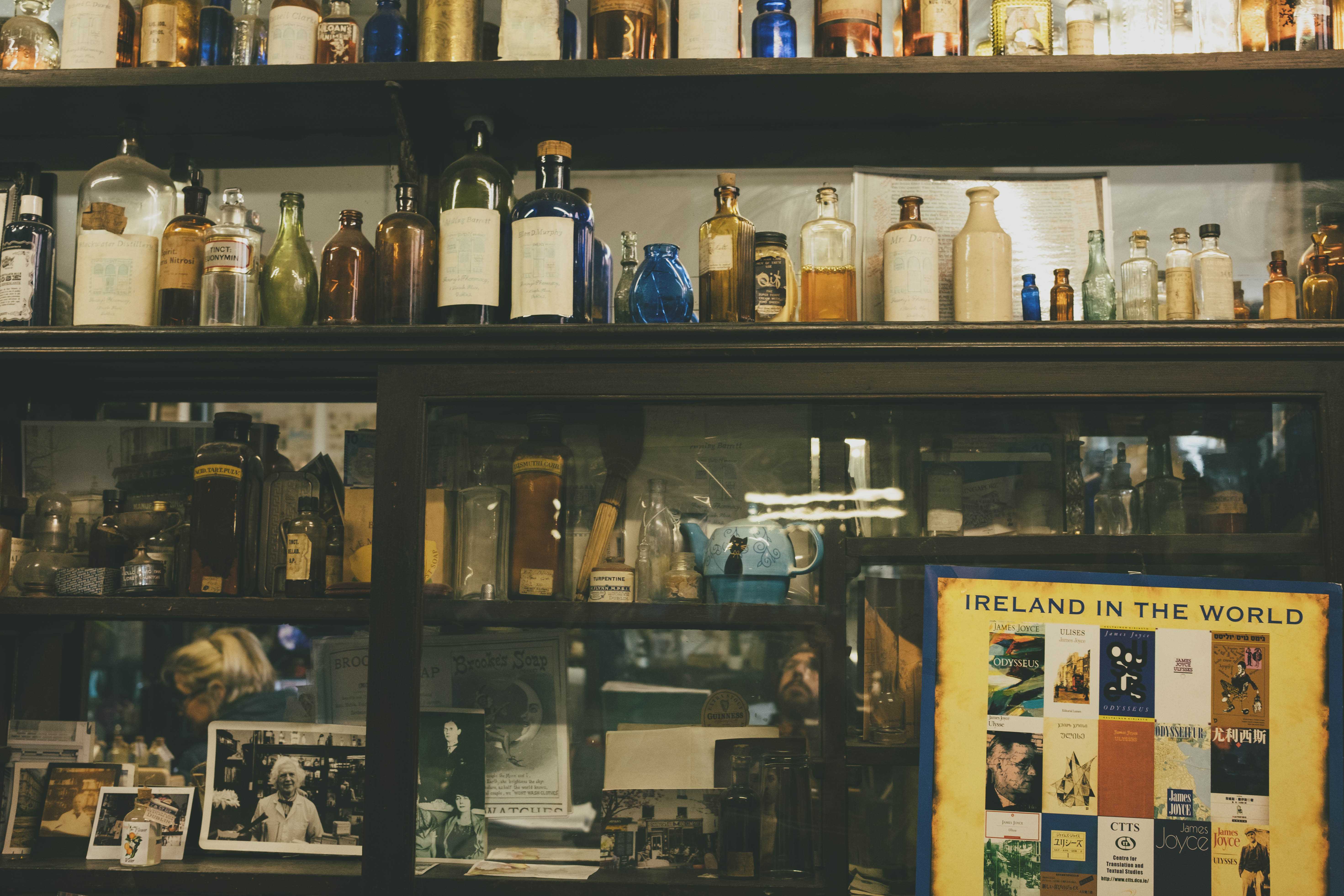 Rows of shelves with old medicine bottles