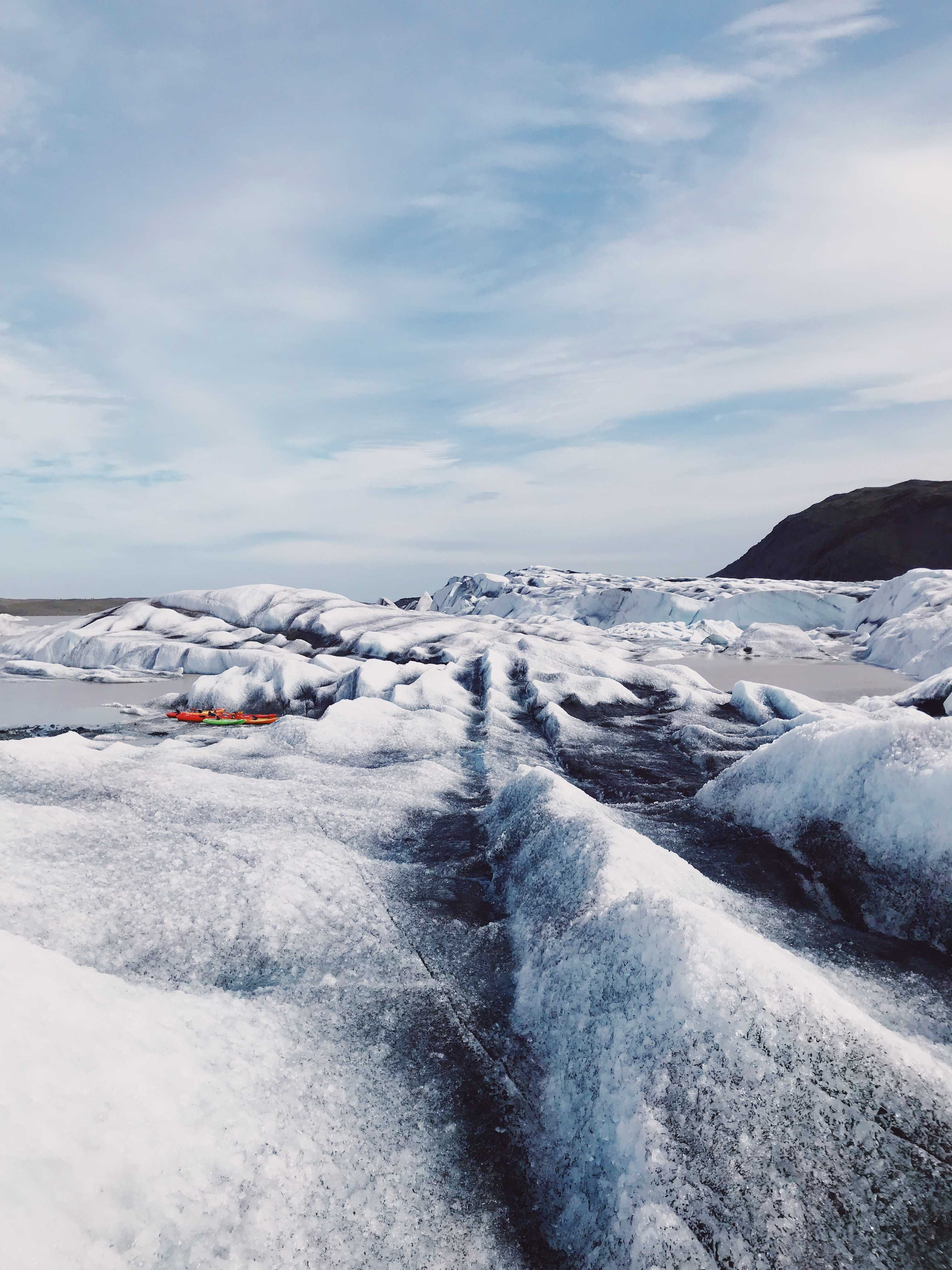 Kayaks parked on an iceberg