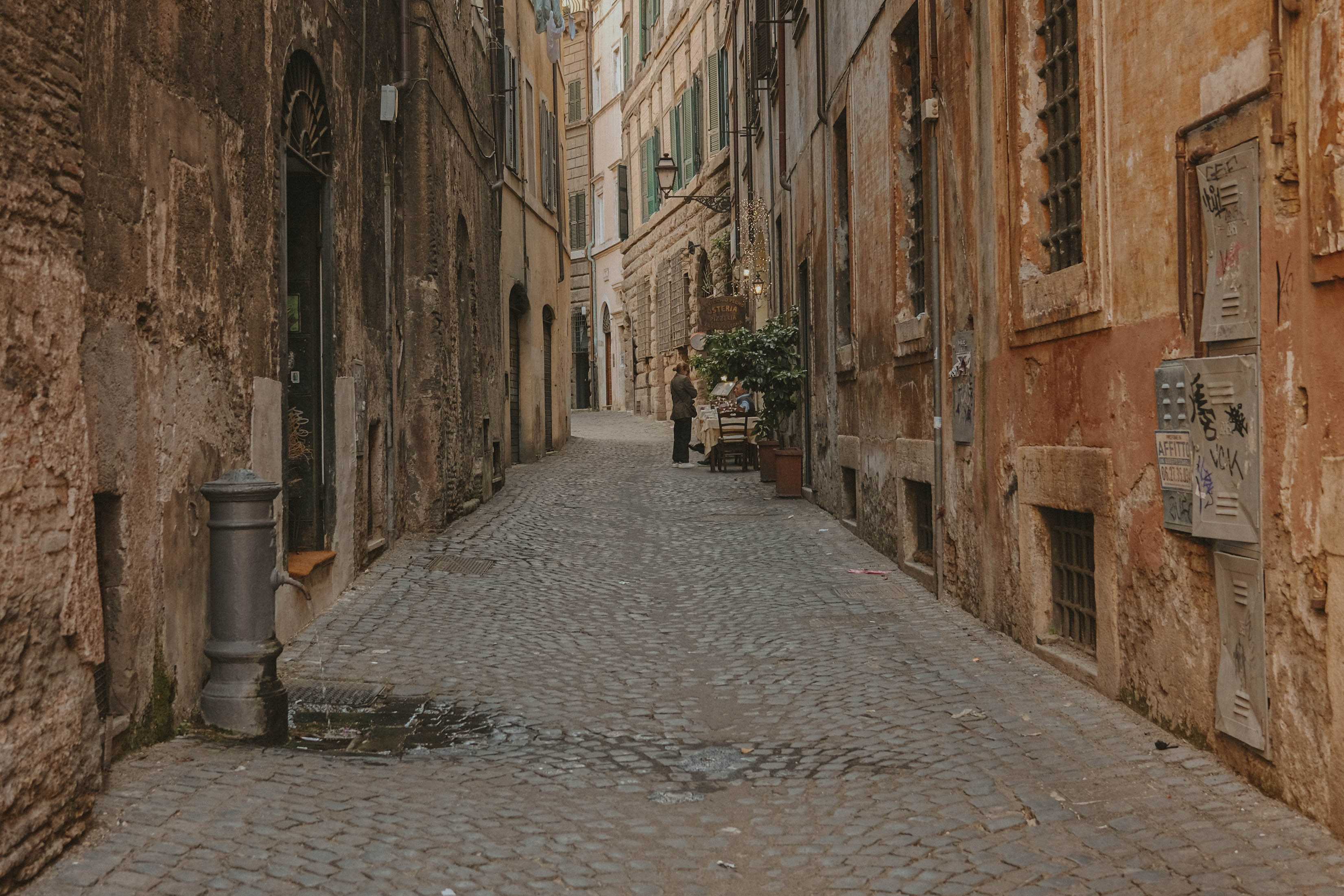 Roman drinking fountain on an empty street